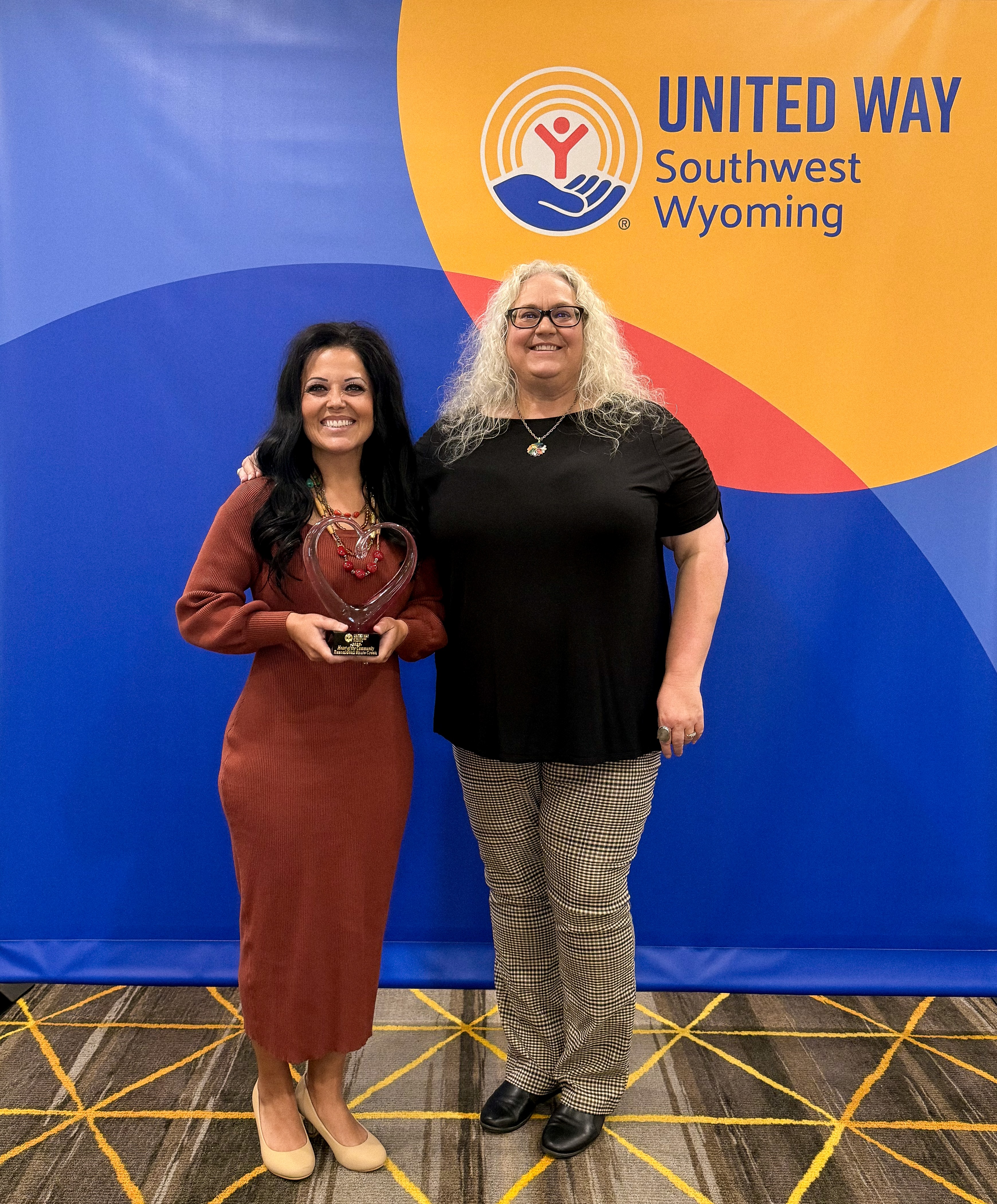 ExxonMobil employees with the Heart of the Community award