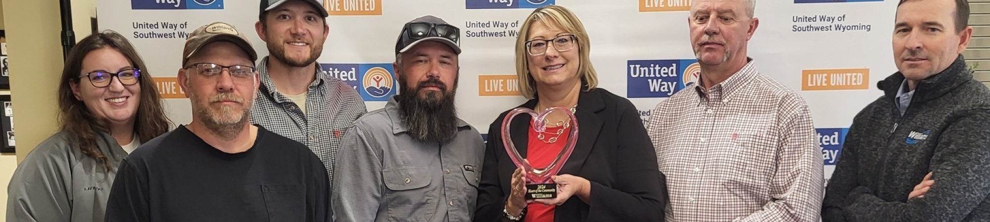 Williams employees accept the Heart of the Community award.